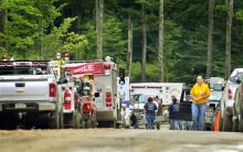 A helicopter crash in a remote, wooded area of northeastern Pennsylvania claimed the lives of five people, state police said Sunday July 28, 2013.The crash apparently happened Saturday night after radar and communication contact with the helicopter was lost, according to the Federal Aviation Administration. The helicopter had taken off from a central New York airport with five people on board, according to the FAA. (AP Photo/The Times Leader, Aimee Dilger)