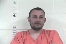 This image provided by the Bullitt County Detention Center shows the May 13, 2013 booking photo of Trevor Runyon. Authorities in Kentucky say the man had an overnight feast in a closed supermarket outside Louisville. (AP Photo/Bullitt County Detention Center) 