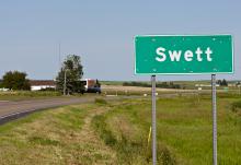 A roadsign for the small unicorporated town of Swett in southwestern South Dakota. A businessman who owns the entire town is selling it for $400,000.