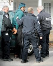 James McMillan, 43, is taken into custody by Scott Township police Wednesday afternoon after an accident on the Old Berwick Road. (Press Enterprise/Keith Haupt)