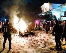 Bloomsburg University students celebrate the Philadelphia Eagles Super Bowl victory around a bonfire on Fetterman Avenue, just off campus, late Sunday.