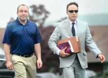 Eric Bower walks with his attorney Pat O'Connell into District Judge Marvin Shrawder's office on Thursday. (Press Enterprise/Keith Haupt)