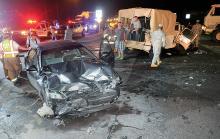 Soldiers wait to unload a Humvee after it was involved in a two-vehicle crash at the intersection of Route 54 and Sheraton Road in Valley Township late Wednesday night, injuring three people.