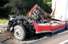 Press Enterprise/Keith Haupt The cab of this tractor trailer was ripped apart in an early morning crash along Interstate 80 near Buckhorn Monday. Two people were taken to the hospital from the crash that involved a PennDot truck