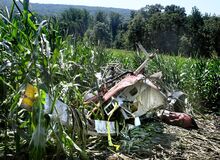 Special to the Press Enterprise/The wreckage of a small helicopter lies in a cornfield after Saturday's crash.