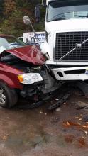A Chrysler Town and Country minivan collided with this tractor trailer Friday morning on Millville Road. (Julye Wemple/Press Enterprise)