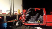 Edward Katona, of Mifflinville, had to be cut from this GMC Sierra pickup truck Tuesday night after he slammed into the back of a tractor trailer on Route 11 near Lows Road.