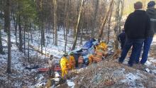 Rescue crews work to free a Berwick woman from her car, following an accident in Fishing Creek Township Monday morning. (Press Enterprise/Julye Wemple)