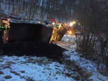 A plow truck overturned after its driver tried to get out of the way of an oncoming car, a township manager said. (Special to the Press Enterprise)