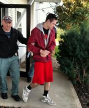 Alexander Hammer, a Bloomsburg University freshman, is led out of district court by Officer Paul Allen. Hammer is charged with selling marijuana wax out of his dorm room. (Press Enterprise/Leon Bogdan)