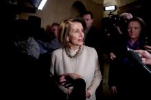 House Speaker Nancy Pelosi enters the capitol Friday morning.