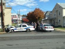 The front end of a Bloomsburg police cruiser was mangled in a crash with a utility pole on Friday. Ptlm. Lewis Carl had swerved the cruiser to avoid a car pulling into his path, police say. (Special to the Press Enterprise/Mike Dove)