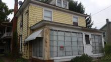 This apartment building at 660 Old Berwick Road in Bloomsburg is where police say they found the decomposing body of Christopher Cameron. (Press Enterprise/Julye Wemple) 