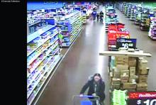 A surveillance still shows the suspect police say tried to steal over $700 worth of baby formula.
