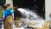 Fire crews battle a garage fire at 830 Winding Road in Fishing Creek Saturday afternoon. (Press Enterprise/Julye Wemple)