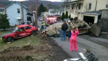Residents gather around an accident scene on Grant Street in Shickshinny. (Press Enterprise/Jimmy May)