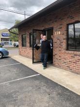 Salvador Ortiz, 32, is escorted out of district court Tuesday by State Police.