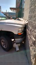 A 2002 Chevrolet Silverado remains where it crashed into the Staples store in Scott Town Plaza in Bloomsburg on Thursday morning. (Press Enterprise/Leon Bogdan)