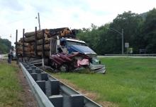 Officials say it appears a woman pulled her car into the path of a log truck at the intersection of Routes 54 and 642 on Wednesday. (Press Enterprise/Chris Krepich)