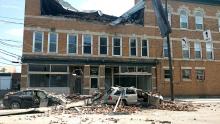 The third floor of 102-106 E. Second St., Berwick, collapsed onto traffic in the turn lane of the road Wednesday. (Press Enterprise/Jimmy May)