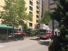 Fire trucks are stationed outside of Geisinger Monday due to a fire caused by welding on the unoccupied fifth floor of Bush Pavilion. (Press Enterprise/Chris Krepich)