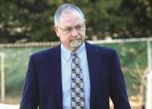 Scott Lowe arrives for his hearing at District Judge Russell Lawton’s Court in Scott Township Wednesday morning. (Press Enterprise/Keith Haupt)