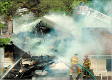 A view of the deadly blaze at 76 Main St., Mocanaqua.