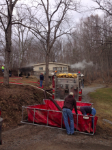 Smoke exits the roof at 62 Gass Road. (Press Enterprise/Kristin Baver)