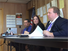 Columbia County Coroner Jeremy Reese speaks about his decision to declare three recent drug overdoses homicide, while Assistant District Attorney Rebecca Reimiller and Hemlock Township Sgt. Scott Traugh look on. (Bill Hughes/Press Enterprise)