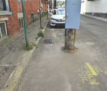 A pole is installed two feet from the curb in the 200 block of Iron Street in Bloomsburg. PPL plans to build a bulb-out to surround the pole. (Press Enterprise/Jimmy May)