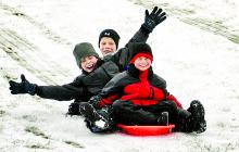 Catawissa boys Jake Rose, Kaiden Carl and Trevor Yorks share a sled