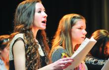 Bloomsburg's Laura Kacyon, left, and Millville's Hannah Temple sing their parts in Danny Boy