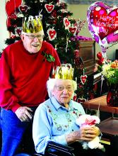 The king and queen of Valentine's Day at Orangeville Nursing and Rehabilitation pose for a picture