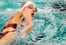BAY swimmer Moriah Treadway moves through the water on her way to winning her heat in the 200-yard freestyle during the Monroe Division championships of the Penndel YMCA Swim League at the Bloomsburg Middle School pool on Sunday. 