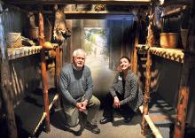 Children’s Museum director Shawna Meiser sits with guest speaker David Minderhout in the recently rebuilt longhouse at the Children’s Museum in Bloomsburg on Friday. Minderhout, Bloomsburg University emeritus professor of anthropology, was the speaker for the third in a series of museum luncheons for adults called Food for Thought. His talk was titled “10 Things You Didn’t Knoe About Pennsylvania’s Native Peoples.” The longhouse was rebuilt by Diane Wukovitz and members of the museum’s exhibit committee. 