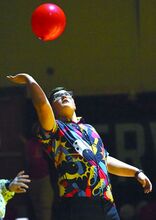 Jackson Romig bats one of the balloons back up in the air while keeping it a loft at Tuesday morning’s dance in Berwick.