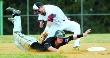 Bloomsburg University shortstop Tim Ravel puts a tag down on Millersville's Tyler Orris in the second inning of their game Friday at BU.