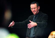 Ret. Col. Timothy Foley leads members of the Berwick High band in rehearsal.