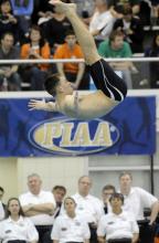 Central Columbia's Sam Juckes performs his second dive Thursday.