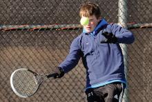 Central Columbia's Tristan Snyder prepares to return a volley during his match against Hughesville's Mitchell Thomas on Wednesday afternoon at Bloomsburg University. (Jimmy May/Press Enterprise)
