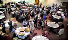 The ballroom in Kehr Union on the Bloomsburg University campus is turned into a soup kitchen for the 12th annual Empty Bowls benefit for the Bloomsburg Food Cupboard on Sunday. Area restaurants, chefs and community groups donated the soups and breads, served by volunteers consisting of Bloomsburg University students, faculty, staff and community members.