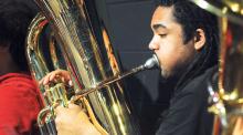 Bloomsburg High School Tuba player Dante Green rehearses with the Region IV Band Thursday. The annual Region Band concert will be held Friday evening at 7:00 p.m. at Western Wayne High School with guest conductor Jason Worzbyt professor of Bassoon and associate director of bands at Indiana University of Pennsylvania.