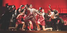 Benton Drama Club’s Nathan Crispell as FBI agent Carl Hanratty sings “Don’t Break the Rules” with the Broadway Chorus Girls during Tuesday evening’s dress rehearsal of "Catch Me if You Can." See pictures of the shows from Benton and Millville on pages 6 and 20 of today's edition.