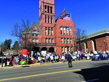 A crowd of protesters gather Saturday outside the Columbia County Courthouse on Main Street in Bloomsburg. On International Women's Day, signs expressed “Feminism vs Fascists” and “Stop Trans Genocide.” Others at the rally opposed to a proposed budget plan that could jeopardize the health insurance coverage of millions of low-income and disabled people who rely on Medicaid. “Hey Dan Meuser Medicaid Saves Lives,” read a banner, referencing Congressman Dan Meuser, who represents all of Columbia, Montour and N
