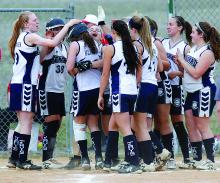 Central Columbia's Mackenzie Klinger, third from left, is met at home plate by her teammates after hitting a two-run homer. 