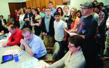 Students and parents came out to Monday's meeting to talk about the possibility of job cuts in the coming school year. 