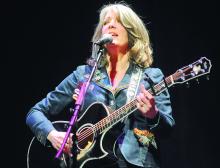 Grammy Award winner Kathy Mattea sings one of her songs as the keynote speaker at Bloomsburg University's 22nd Annual Health Sciences Symposium.