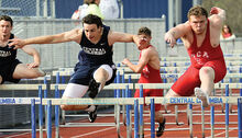 Central Columbia’s Levi Bartholomew, left and Mount Carmel’s Christian Kelley run neck and neck as they cross the last hurdle in the 110-meter hurdles during Tuesday afternoon’s meet at Central.Central Columbia’s Levi Bartholomew, left and Mount Carmel’s Christian Kelley run neck and neck as they cross the last hurdle in the 110-meter hurdles during Tuesday afternoon’s meet at Central.