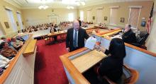 Assistant District Attorney Daniel P. Lynn, center, holds evidence while asking a question of Ashley Abrams, who was portraying the victim during a mock rape trial Thursday evening at the Columbia County Courthouse. The event was presented by The Women's Center and used members from the county in their rolls as well as actors to fill the parts of witnesses. Judge Gary E. Norton presided over the case.