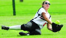 Benton right fielder Sarah Stevens can't get under a fly ball in the second inning of a game against Bloomsburg Thursday at Bloomsburg. One run scored on the hit to right.